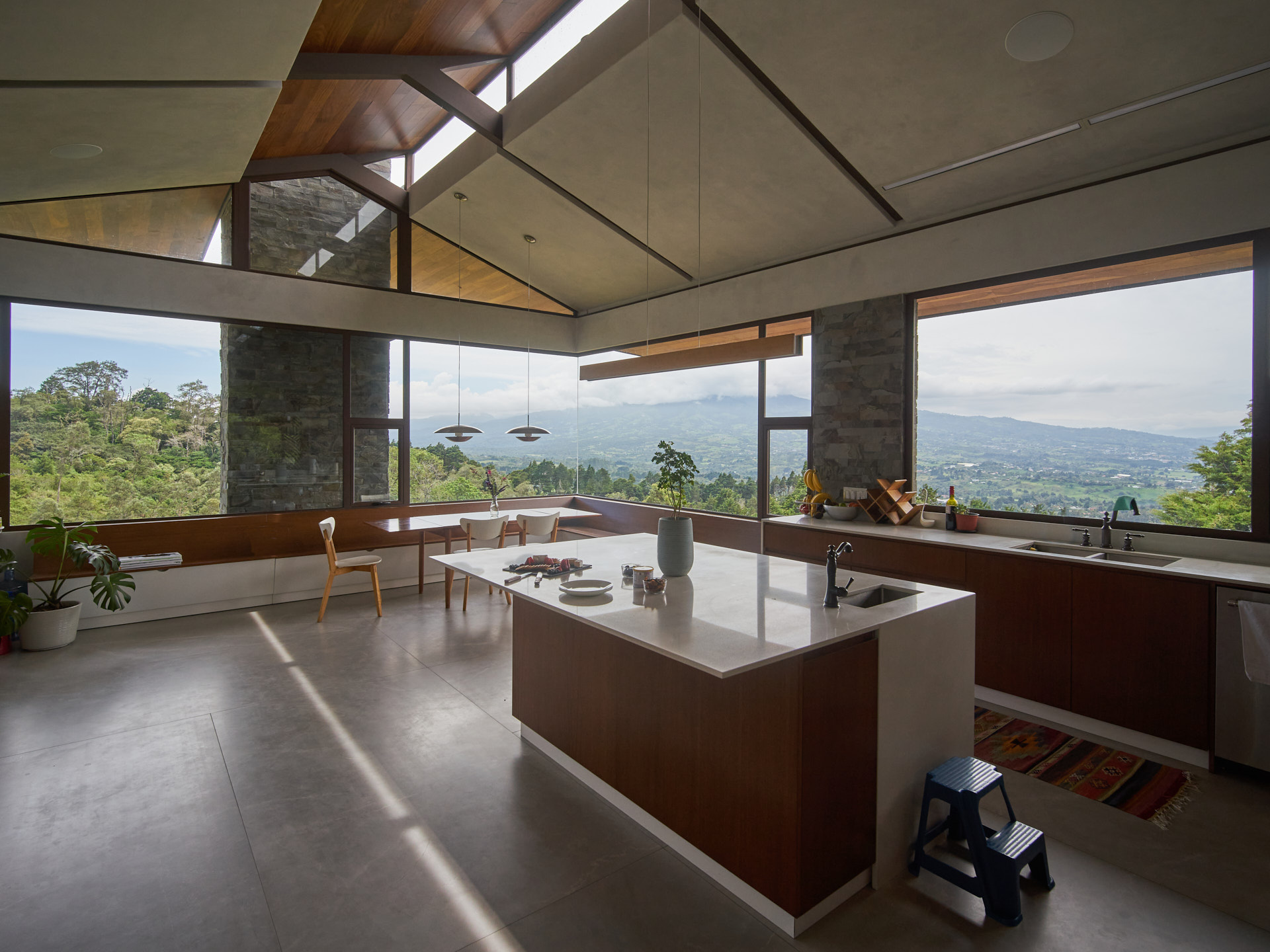 Kitchen at Musdan Estate with a panoramic view of the mountains and volcano.